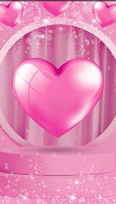 a pink heart surrounded by hearts on a pink background with stars and sparkles in the air