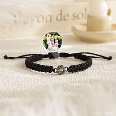 Customized Photo Projection Bracelet, Braided Rope Bracelet for Her, Picture Bracelet, Photo Picture Inside,Memorial Gift,Gift for Boyfriend ------------------------------------------- HOW ∙ TO ∙ ORDER * S T E P 1 Make your selections from the drop-down boxes within the listing. * S T E P 2 Add to Cart and Checkout * S T E P 3 Send me your high-quality image via messages. (Send pictures to Etsy message, button below the store). - Please send me your photo of choice after purchase for a customisa Engraved Braided Bracelet Gift, Engraved Braided Bracelet As Gift, Engraved Braided Bracelets As Gift, Personalized Braided Bracelet Gift, Engraved Round Braided Bracelets As Gift, Adjustable Bracelet For Mother's Day Keepsake, Personalized Black Friendship Bracelets, Photo Projection Bracelet, Picture Bracelet