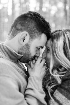 black and white photograph of a couple smiling at each other