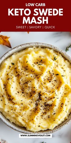 a bowl filled with mashed potatoes on top of a white plate