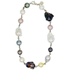 Round and baroque pearl beads in a variety of colors, including Tahitian, White, Pink, Gold, Black and Gray, linked together in a handmade sterling silver collar necklace. Pearls range from 13mm to 30mm in size. Necklace is 18 inches in length. This contemporary take on timeless pearls has a versatile color palette and unique style. Elegant Multicolor High Luster Necklaces, Elegant Multicolor Jewelry With Pearl Charm, Elegant Multicolor Pearl Charm Jewelry, Elegant Handmade Multicolor Pearl Necklace, Elegant Multicolor Single Strand Pearl Necklace, Elegant Multicolor Pearl Necklace With Charm, Elegant Multicolor Pearl Chain Necklace, Elegant Multicolor Pearl Necklace For Formal Occasions, Princess Necklace