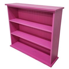 a pink bookcase with three shelves on each side and one shelf above the other