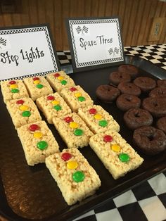 there are many different types of treats on the trays at this event, including rice krispy treats and sprite trees