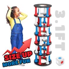 a child standing next to a toy tower