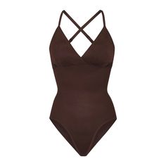 A signature SKIMS silhouette, now in light compression shapewear that targets the tummy and core. This everyday staple has adjustable straps, double-lay... Compression Shapewear, A Signature, Shapewear, Cocoa, Adjustable Straps