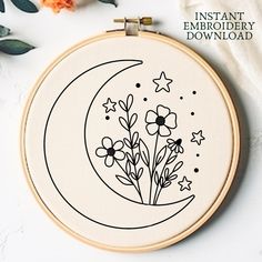 the embroidery pattern has flowers and stars on it