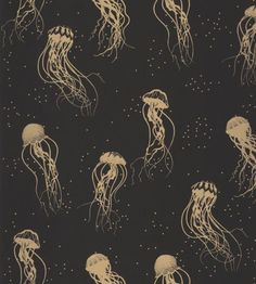 a group of jellyfishs floating in the ocean on a black background with white dots