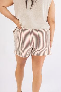 Description Upgrade your wardrobe with our "Staple Striped Shorts"! These brown and cream striped shorts are not only cute, but also perfect for the neutral boxer short trend. Stay stylish and comfortable in this must-have item. Material 55% cotton 45% polyester Size Chart DARCIE IS IN A LARGE. Best Bags, Boxer Shorts, Athletic Wear, Dress Romper, Striped Shorts, Denim Skirt, Jumpsuit Romper, Lounge Wear, Size Chart