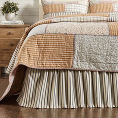 Craft an eclectic, cottage-style bedroom with classic fall colors with a vintage twist and soft, cotton linen fabrics. The Kaila Queen Bedskirt 60x80x16 completes the look of your country chic bedding with vertical stripes in navy blue on a cream base. This cotton dust ruffle is the perfect blend of practical and stylish. Features a long 16-inch drop to ensure that the fabric reaches your floor for a neat, put-together look that blocks under-bed storage from view while also keeping dust out of h Country Chic Bedding, King Bed Skirt, Cottage Style Bedroom, Vintage Farmhouse Bedroom, Vintage Country Farmhouse, Cottage Bed, Vhc Brands, Striped Bedding