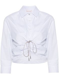 white cotton blend stretch-design poplin texture classic collar three-quarter length sleeves buttoned cuffs front ruched detailing front tie fastening with rhinestone embellishment cropped front button fastening Classic White Cropped Shirt With Button Closure, Luxury Chic Cotton Cropped Shirt, Classic Cropped Button-up Shirt With Button Cuffs, White Cotton Cropped Shirt With Button Closure, White Poplin Tops With Button Cuffs, Cropped Long Sleeve Top, City Dress, Front Tie Top, Liu Jo