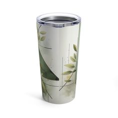 the tumbler cup is decorated with green leaves