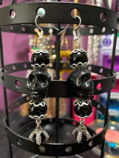 Gothic inspired, beaded Skull Earrings with Dragon claw charm Edgy Silver Beaded Jewelry, Gothic Skull Earrings For Party, Adjustable Gothic Skull Earrings, Nickel-free Skull Jewelry For Party, Nickel Free Black Skull Earrings, Punk Skull Earrings For Party, Handmade Black Skull Earrings, Edgy Pierced Skull Jewelry, Black Skull Print Earrings As Gift