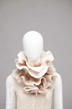 This beautiful scarf is not only pleasant to look at but also very cosy and soft to the skin. It is hand felted from the softest merino wool and adorned with other natural fibres,- silks, wools, ramie, linen, etc. It's classical and splendid,- you can wear it draped in so many ways, you will never get bored with it. Original design - your scarf may be a bit different from the photo. The scarf measures approx. 44" - 9" (112cm - 23cm) FLOWER is not included in this listing. You buy only a scarf. Beautiful Scarf, Felted Scarf, Felted Scarves, Natural Fibres, Brown Shades, Hand Felted, Chocolate Factory, Wool Scarf, Flower Dresses