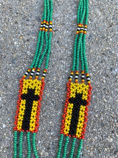 "Make this African necklace yours. Length: 14.5\" Width of bottom: 2\"" Beaded Cross Necklace, African Necklace, Beaded Cross, Beaded Necklaces, Vintage Jeans, Embroidered Friendship Bracelet, Vintage Black, Cross Necklace, Necklace Etsy