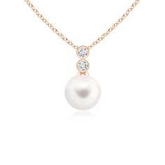 A lustrous Freshwater pearl dangles gracefully below a pair of sparkling diamonds. Crafted in 14K rose gold, the two bezel-set diamonds accentuate the allure of the pearl. Simple yet sophisticated, this classic pearl and diamond pendant necklace is apt for both formal and casual looks. Bezel Set Diamond, The Pearl, Bezel Diamond, Diamond Pendant Necklace, Sparkle Diamonds, Pearl Pendant, 18k Rose Gold, Diamond Pendant, Fresh Water