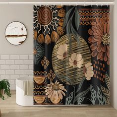 the shower curtain is decorated with flowers and leaves