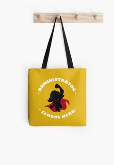 a yellow tote bag with an image of a woman holding a red flag and the words annnistation school hero on it