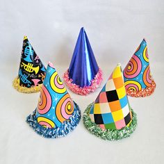 Vintage Set of 5 Cardboard Kids Fringed Party Hats, assorted patterns and colors.  Please judge condition by pictures, like they say a picture is worth a thousand words. Country of Origin: USA Maker/Designer: No makers mark Measures Approx: 7" Condition:  Items are sold in as is condition. Various signs of wear, creases, bends, scratches, tears and some discoloration. The elastics are not very stretchy. NO RETURNS OR EXCHANGES But please contact me if you have any issues with your order Remember Cardboard Kids, Kids Fringe, Colors And Patterns, Vintage Hats, 5 Kids, Vintage Party, Party Hat, Black Spot, Hats Vintage