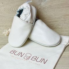 Supersoft baby shoes that support healthy walking habits ❤️🐰Shop Now @bunbuncorp #babyshoes #babyproducts #babfashion #bunbuncorp Comfortable White Leather Shoes, White Slip-on Moccasins With Round Toe, White Non-slip Slip-ons With Round Toe, Spring Leather Booties With Soft Sole, Comfortable White Leather Shoes With Round Toe, White Round Toe Slip-ons For Everyday, Everyday White Slip-ons With Round Toe, White Round Toe Comfortable Leather Shoes, White Leather Slip-ons With Stitched Sole