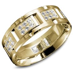 a yellow gold ring with diamonds on it