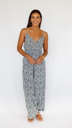 Stand out in this stunning jumpsuit, made to flow with buttery soft rayon and an exaggerated wide pant leg. Features adjustable straps and a gentle smocked waist to flatter. ** Our Model is 5'8" and wearing a size SMALL. ** Fabric and Care Instructions: *100% Rayon *Hand wash cold * Line Dry