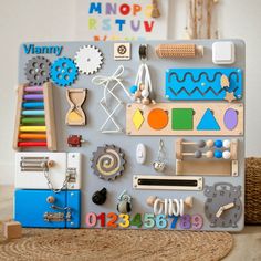 an assortment of wooden toys and magnets on a table