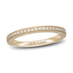 This gorgeous diamond wedding band from the Neil Lane Bridal® collection showcases a row of brilliant round-cut diamonds totaling 1/5 carat in weight. Set in timeless 14K yellow gold, the band is trimmed in classic milgrain detailing and crafted to pair with her matching engagement ring (sold separately). Wedding Band Gold, Neil Lane, Weight Set, Kay Jewelers, Diamond Wedding Band, Gold Wedding Rings, Matching Band, Gold Wedding Band