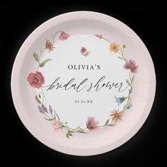 a paper plate with flowers on it that says, ollivia's bridal shower