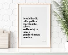 a framed poster with the quote i would hardly call my self an expert on this subject, and by subject, i mean genuine human emotion