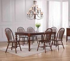 Welcome a touch of French country and traditional American style into your home with this hidden leaf dining set that expands from 56” to 72” to allow seating for up to eight friends and family. The warm chestnut brown wood brings an inviting comfort that will update your kitchen or dining room, ideal for formal and casual dining. Windsor chairs are famous for their uncomplicated and universal design. Constructed from solid eco-friendly Malaysian oak, this farmhouse chic dining set is truly timeless and looks fantastic when paired with other dining room furniture pieces in the Andrews Collection. Butterfly Dining Table, Butterfly Leaf Table, Assembly Table, Dining Furniture Sets, Chestnut Brown, Rectangular Dining Table, Rectangular Table, Dining Room Sets, Kitchen Dining Furniture