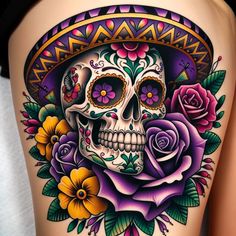 a woman's thigh with a colorful skull and flowers on the side, wearing a sombrero