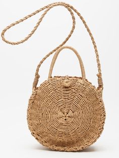 Elevate Your Summer Style with the Morgan Rattan Round Bag! 🌞✨ Fit: This versatile bag features a spacious interior with a secure button closure, perfect for carrying your essentials in style. Features: Crafted from durable, eco-friendly materials, it comes with both top handles and a crossbody strap for multiple carrying options. Why We Love It: Its classic design and neutral colors make it the ideal accessory for any summer outfit, seamlessly blending fashion and function. Colors: Tan & Ivory