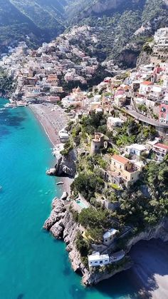 an aerial view of a beach with houses on it