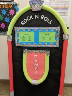 the rock n roll game is made out of foam and paper mache with neon colors