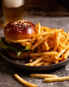 a hamburger and french fries on a plate