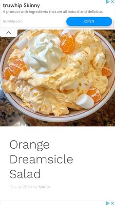 an orange creamsice salad with whipped cream on top is shown in the instagram