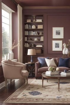 a living room with purple walls and furniture