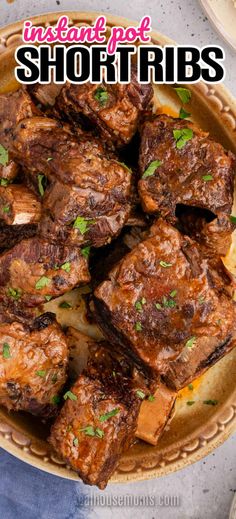 a plate full of short ribs with parsley on top and the words instant pot short ribs above it