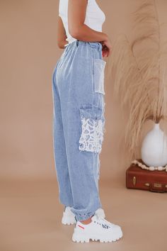 Elevate your denim game with our POL: Distressed Denim joggers! These high rise, jeans give you a flattering fit while the medium wash and lace patchwork details keep you on-trend. Say goodbye to boring jeans! 100% Cotton imported Elastic waist band + Tie Patchwork detailing + distressing Functional pockets Zip + button closure Jogger Measurements:(Approximate. Measured laying flat.) **Elastic back waistband allows up to 2" stretch! You can definitely size down Babe. S Waist 30" Inseam 29" Rise Lace Pocket, Everyday Chic, Denim Joggers, Chic Boutique, Distressed Denim, Elastic Waist, Boutique, Lace, How To Wear