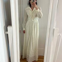 No Brand, The Tags Have Ripped Off. No Size Tag, Fits Like Modern S/ M. Modeled On Xs. I Usually Wear It With A Belt To Cinch In The Waist. Perfect As An Alternative Wedding Dress For The Modern Bride. It Is In Fairly Good Vintage Condition But The Buttons Have A Bit Of Discloration. Measurements: Pit To Pit: 18” Waist: 14” Length: 59” Alternative Wedding Dress, Button Up Maxi Dress, Alternative Wedding Dresses, The Modern Bride, Lace Button, Alternative Wedding, Modern Bride, White Maxi Dresses, White Beige