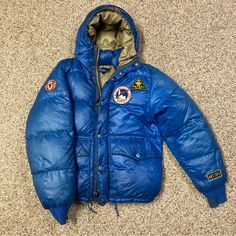 Super Rare Size Small Polo Raph Lauren Mountain Expedition Patch Yosemite Ski Rescue Patrol Puffer Jacket In Used Condition. A Combination Of Interesting Colors, Patches, And Leather Accents. These Jackets Are Few And Far Between, Hard To Find Nearly Anywhere On The Internet. Flaws Are Pictured (Slight Fading/Discoloration On Shoulders And Sleeves). Make Me An Offer. Retro Blue Nylon Outerwear, Fitted Blue Outerwear For Outdoor, Blue Nylon Patchwork Outerwear, Retro Fitted Blue Outerwear, Fitted Retro Blue Outerwear, Blue Fitted Retro Outerwear, Raph Lauren, Ski Patrol, Leather Accents