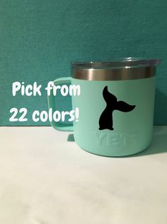 a green cup with a black dog on it and the words pick from 22 colors