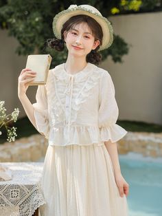 The price is for a blouse only, others are not included.  Garment Size   	 		 			Size 			S 			M 			L 		 		 			Full Length 			40.5 			42 			43.5 		 		 			Bust 			90 			94 			98 		 		 			Shoulders 			35 			36 			37 		 		 			Sleeve Length 			34 			34.5 			35 		 		 			Hem Circumference 			95 			99 			103 Casual Doll Collar Blouse For Spring, Casual Doll Collar Blouse For Summer, Feminine Doll Collar Blouse For Spring, Summer Cotton Blouse With Doll Collar, Fitted Summer Blouse With Doll Collar, Summer Fitted Blouse With Doll Collar, Feminine Doll Collar Blouse For Summer, Feminine Summer Blouse With Doll Collar, Collar Blouse In Beige For Summer