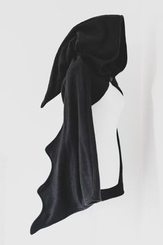 Want to be comfy and cozy but still look absolutely stunning at the same time and make a big impression on everyone who sees you? Then this 'Witchy bat wings' shrug is the perfect addition to your outfit! The garment can be worn as a shrug, over you favorite dress or any other outfit. With these amazing sleeves you'll be the star at every Halloween party! Or just, everywhere you go ;) The shrug is made with polar fleece fabric in black. The hood is cute and pointy and lined with an extra layer o Batwing Hoodie, Fitted Long Sleeve Cape For Winter, Fitted Long Sleeve Winter Cape, Bat Cloak, Fitted Winter Cape For Cosplay, Bat Outfit, Gothic Long Sleeve Cape For Fall, Black Long Sleeve Cape For Halloween, Bat Clothes