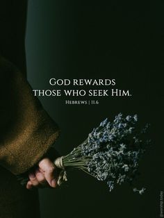 a person holding a bunch of flowers with the words god rewards those who seek him