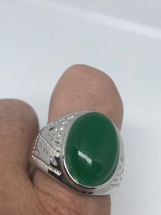 Large green nephrite jade Ornate German Silver Vintage ring, does not tarnish, NOT sterling Sizes 9, 10 and 11 All rings are shipped in a nice gift box. Check out our over a THOUSAND great reviews Engraving is $4 per letter and is not always perfect depending on the piece. It can take a few days if the jeweler is busy. This is payable to Paypal Judithsltd@gmail.com Classic Green Jade Rings, Green Jade Ring As A Gift, Green Jade Ring For Gift, Green Jade Ring Suitable For Gift, Green Rings With Polished Finish As Gift, Green Polished Finish Rings For Gift, Green Polished Finish Rings As Gift, Classic Silver Ring With Jade, Classic Silver Jade Ring