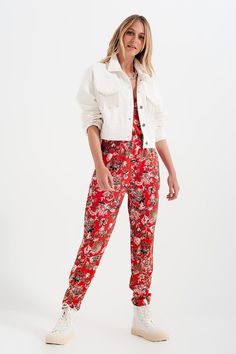 This 100% Cotton white denim jacket has oh so stylish rhinestone fringe on its front utility pockets. The fit is oversized, with drop shoulders and with a cropped silhouette. Very trendy. Layer it over jeans, trousers, or a dress. We show it layered over our High Low Hem Tie Front Dress in Red Ditsy Floral Print, in our photos. The model is 5’9” with measurements of 33-24-34 and is wearing a size small. The fit runs true to size. Luxurious Wardrobe, Types Of Jeans, White Denim Jacket, Tie Front Dress, Fringe Jacket, Cropped Denim Jacket, Black Denim Jacket, Denim Details, Cropped Denim