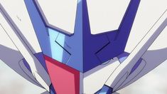 an animated image of a blue and red robot with large wings on it's head