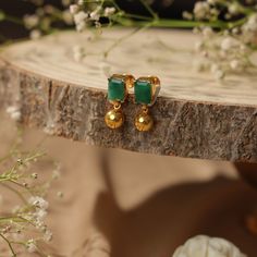 Emerald Stud earrings Traditional Emerald Earrings For Party, Gold Emerald Earrings For Gift, Emerald Earrings Indian, Emerald Studs Indian, Green Stone Studs Gold, Colombian Emerald Earrings, Buy Earrings Online, Emerald Stud Earrings, Emerald Earrings Studs