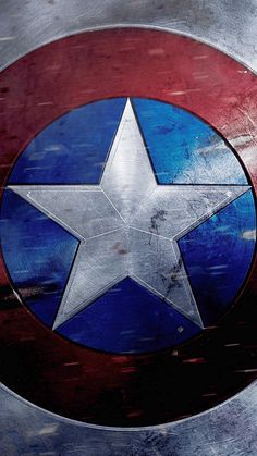 the captain's shield is painted in silver and blue with a star on it